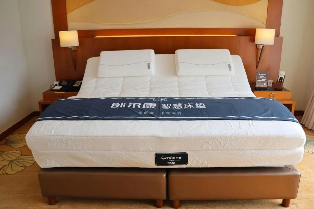 Bed in Jianguo Garden Hotel