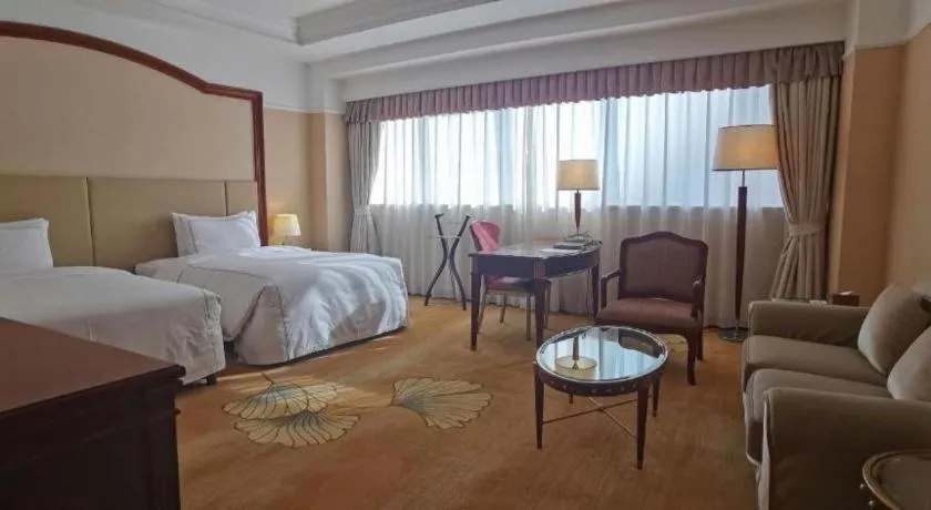 Bed in Jianguo Garden Hotel