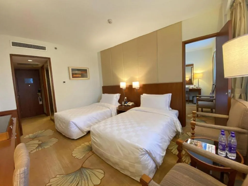 Bed in Jianguo Garden Hotel