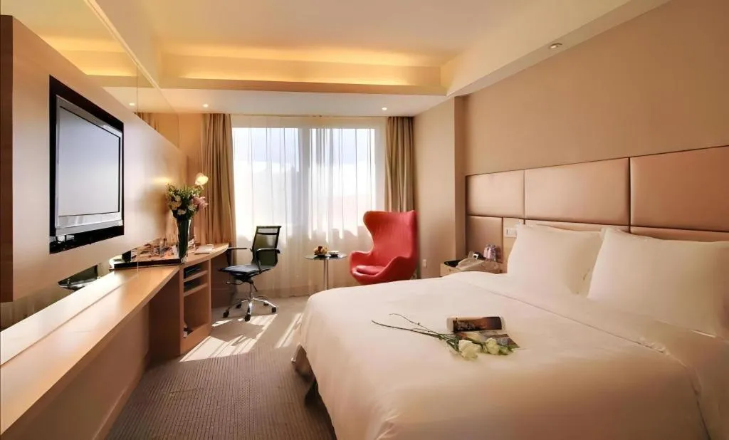 Bed in Seaview Gleetour Hotel Shenzhen Eastwing building