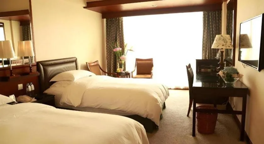 Bed in Seaview Gleetour Hotel Shenzhen Eastwing building