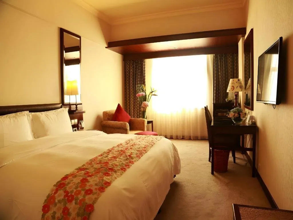 Bed in Seaview Gleetour Hotel Shenzhen Eastwing building