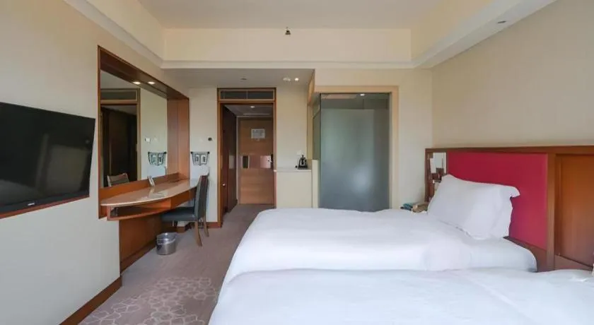 Bed in Seaview Gleetour Hotel Shenzhen Eastwing building
