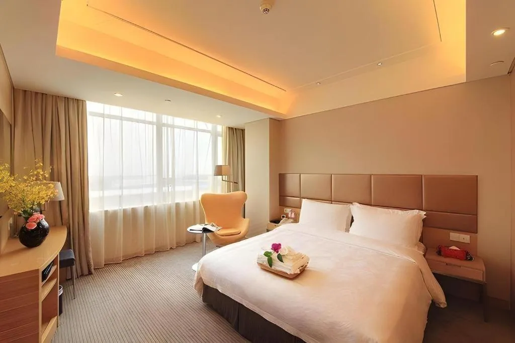 Bed in Seaview Gleetour Hotel Shenzhen Eastwing building