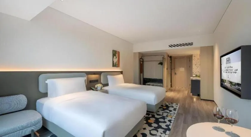 Bed in Seaview Gleetour Hotel Shenzhen Eastwing building