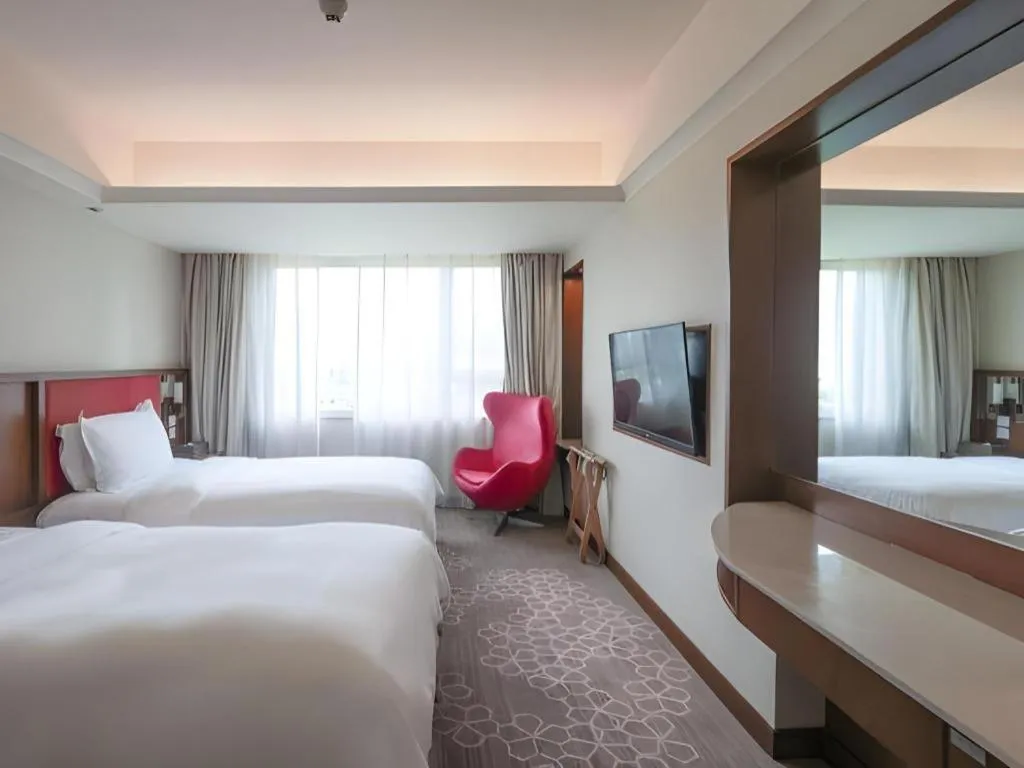 Bed in Seaview Gleetour Hotel Shenzhen Eastwing building