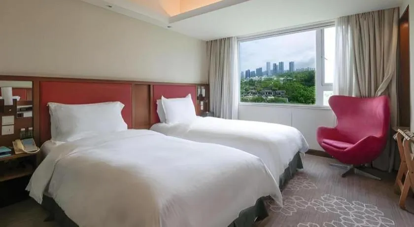 Bed in Seaview Gleetour Hotel Shenzhen Eastwing building