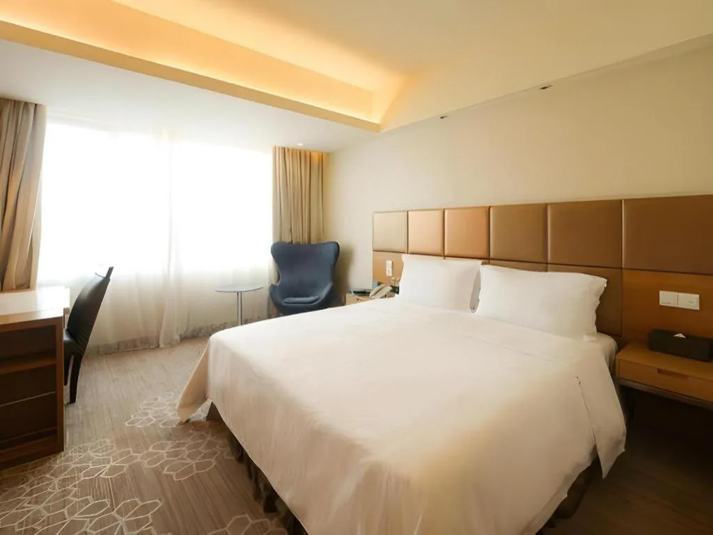 Bed in Seaview Gleetour Hotel Shenzhen Eastwing building