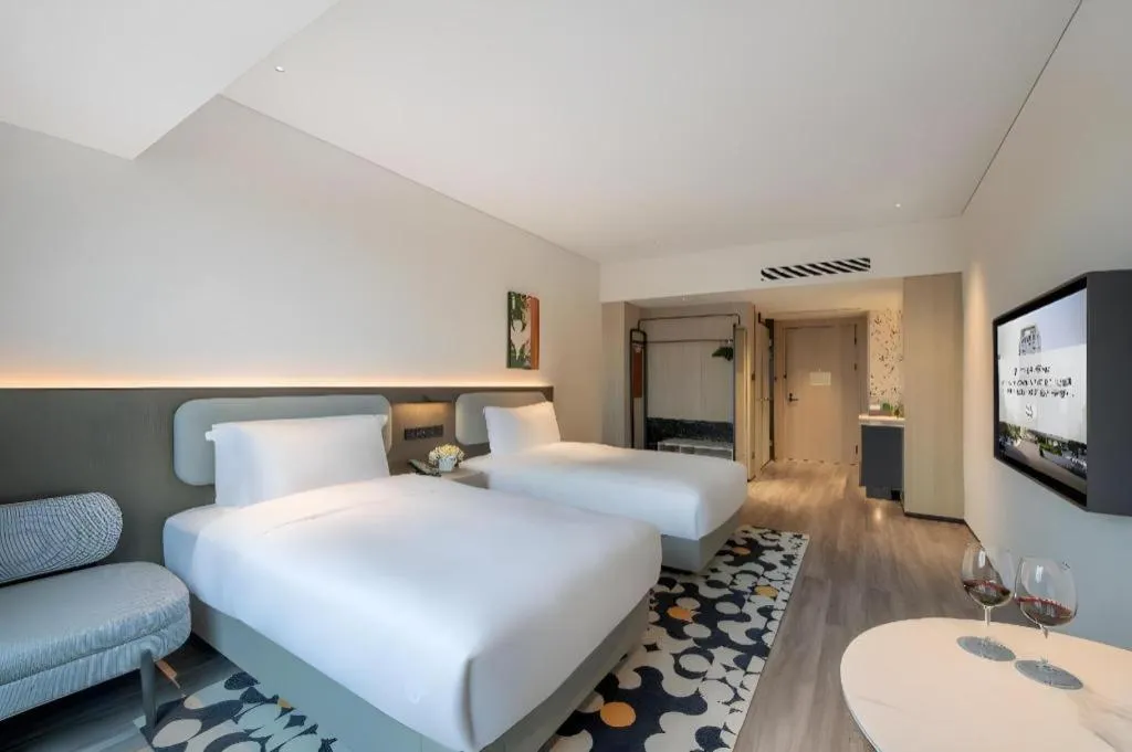 Bed in Seaview Gleetour Hotel Shenzhen Eastwing building