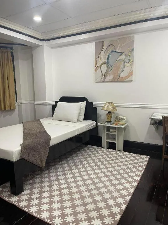 Bed in Vest Grand Suites