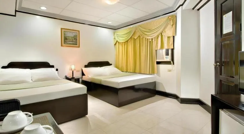Bed in Vest Grand Suites