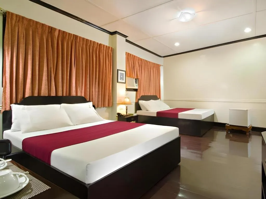 Bed in Vest Grand Suites