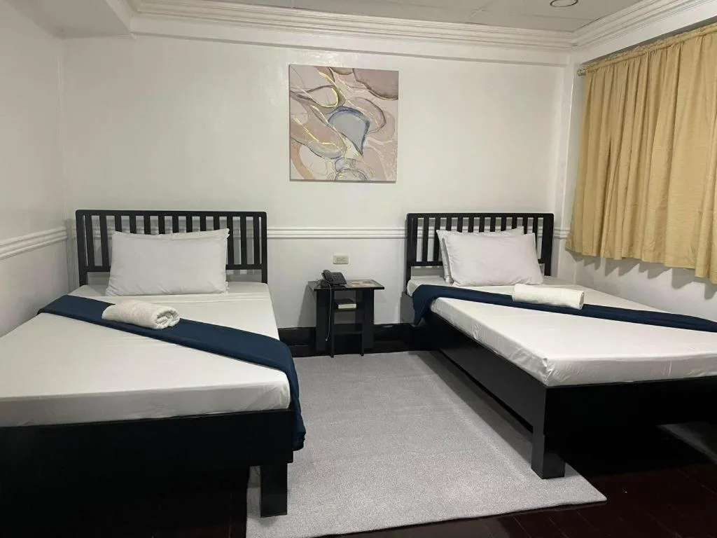 Bed in Vest Grand Suites