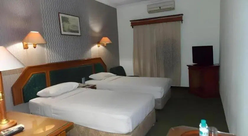 Bed in Puri Mega Hotel Bed in Puri Mega Hotel