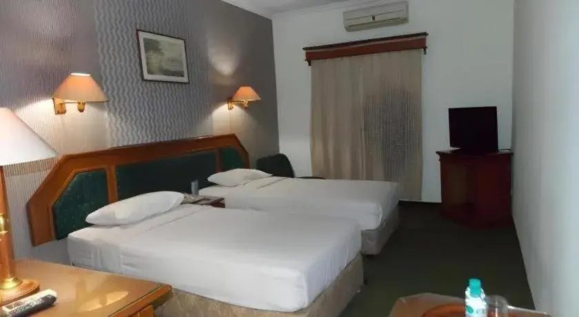 Bed in Puri Mega Hotel Bed in Puri Mega Hotel