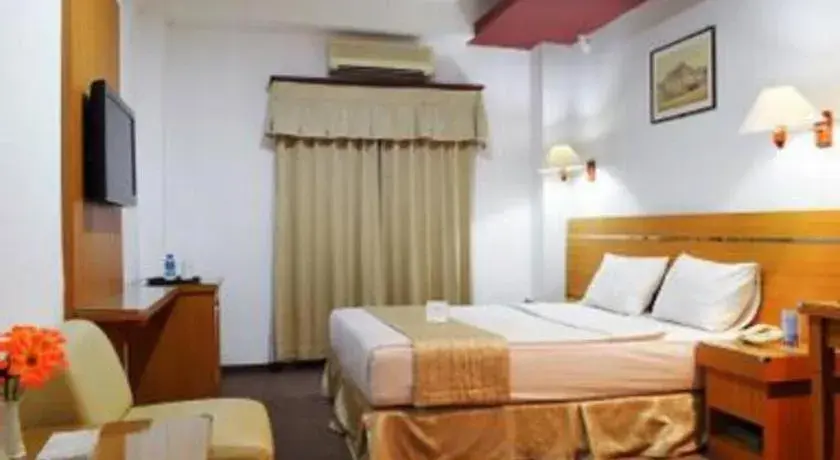 Bed in Puri Mega Hotel Bed in Puri Mega Hotel