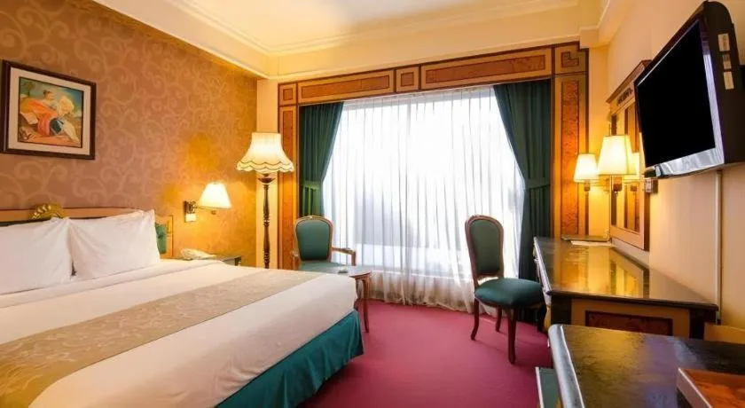 Bed in Gajahmada Graha Hotel