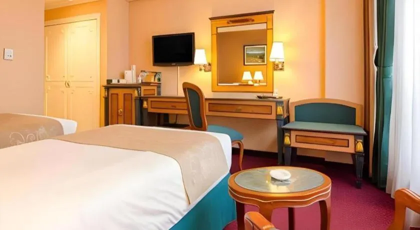 Bed in Gajahmada Graha Hotel