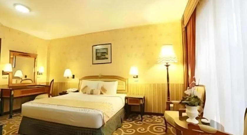 Bed in Gajahmada Graha Hotel