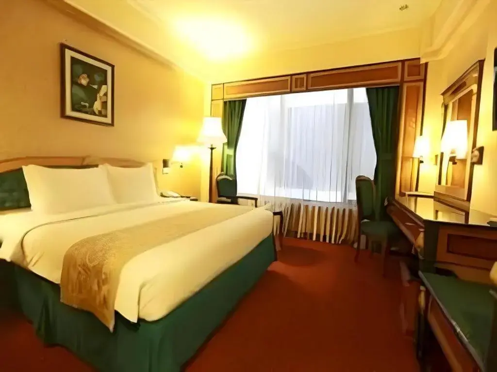 Bed in Gajahmada Graha Hotel Bed in Gajahmada Graha Hotel