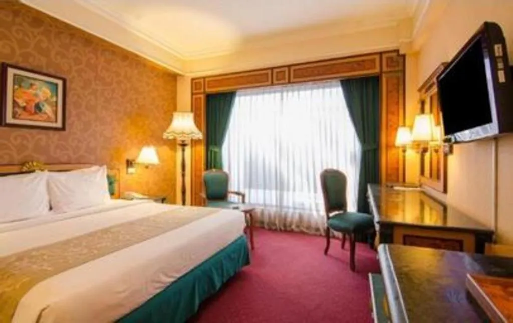 Bed in Gajahmada Graha Hotel