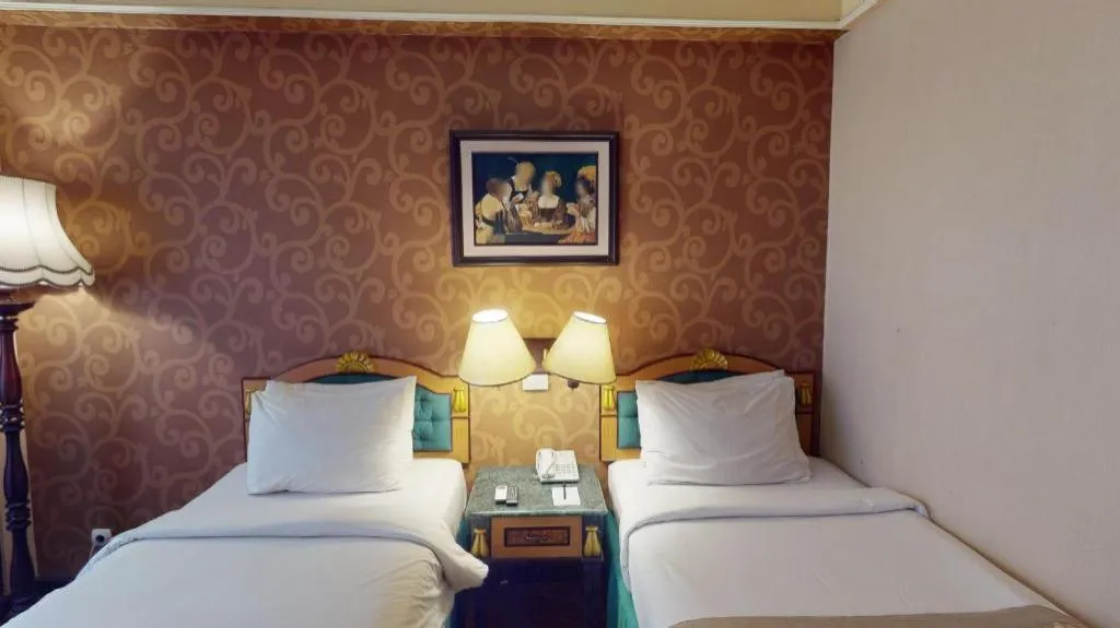 Bed in Gajahmada Graha Hotel