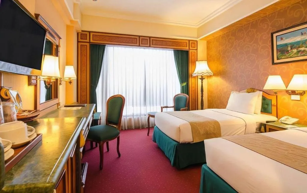 Bed in Gajahmada Graha Hotel