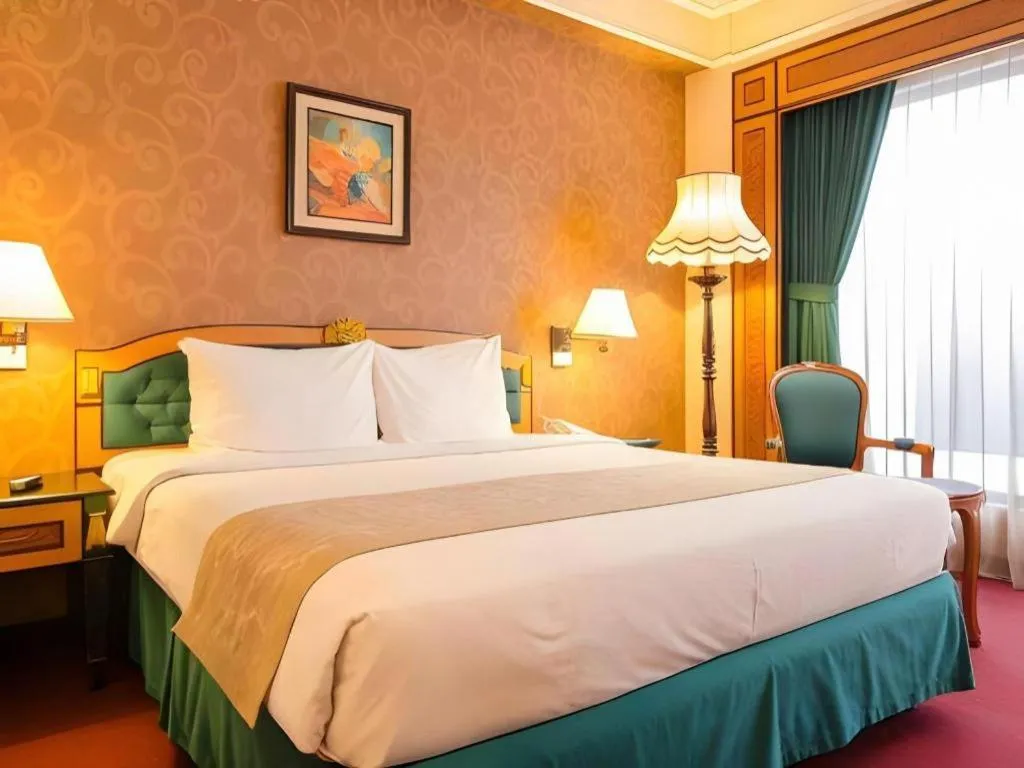 Bed in Gajahmada Graha Hotel