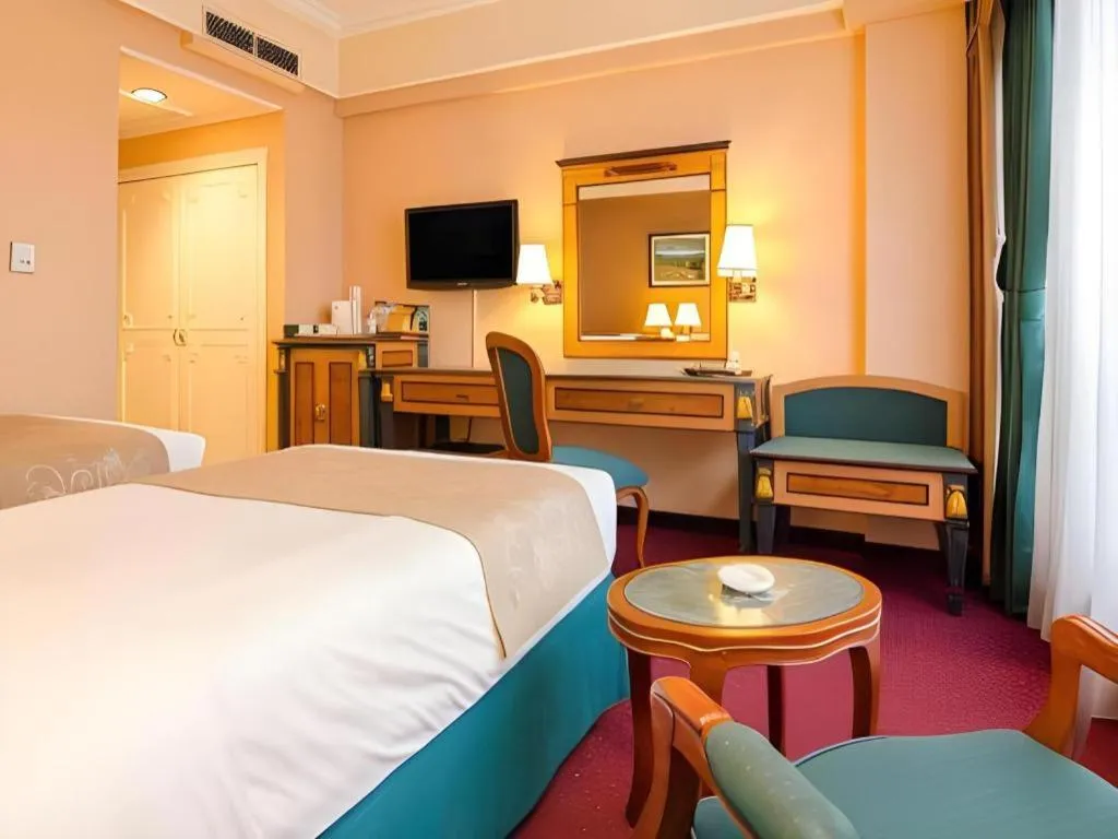 Bed in Gajahmada Graha Hotel