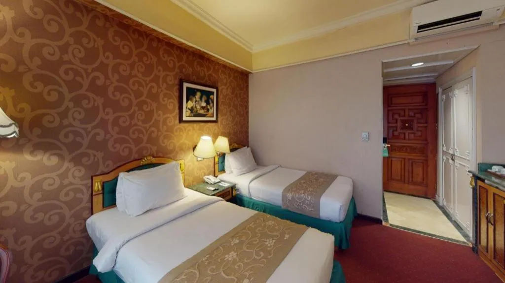 Bed in Gajahmada Graha Hotel