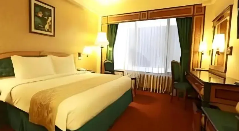 Bed in Gajahmada Graha Hotel Bed in Gajahmada Graha Hotel