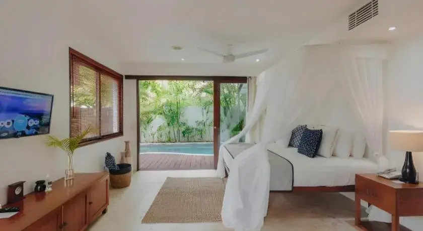 Bed in Batu Karang Lembongan Resort & Spa Bed in Batu Karang Lembongan Resort & Spa