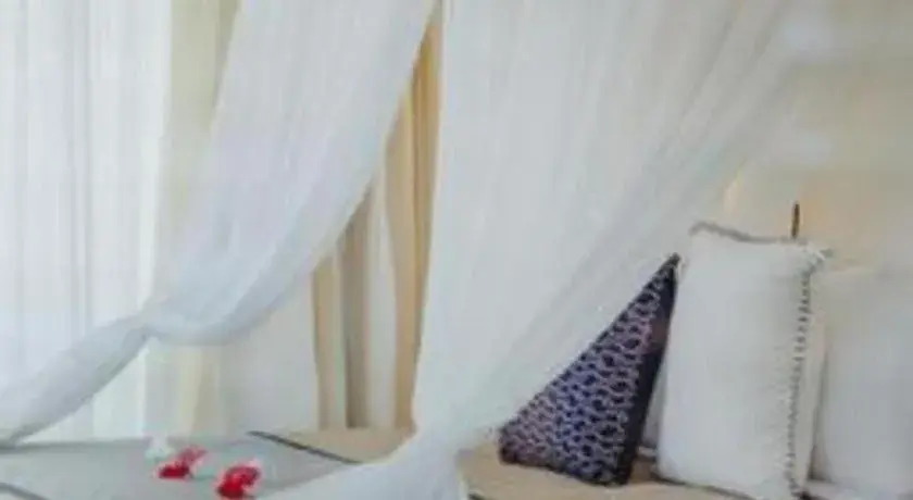 Bed in Batu Karang Lembongan Resort & Spa Bed in Batu Karang Lembongan Resort & Spa