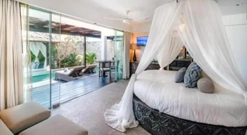 Bed in Batu Karang Lembongan Resort & Spa Bed in Batu Karang Lembongan Resort & Spa