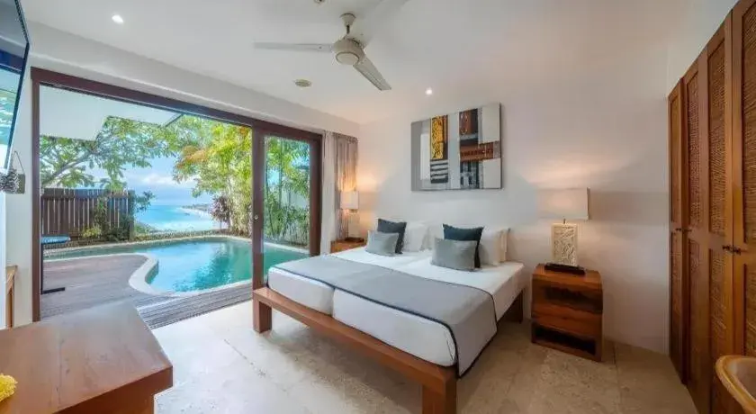 Bed in Batu Karang Lembongan Resort & Spa Bed in Batu Karang Lembongan Resort & Spa