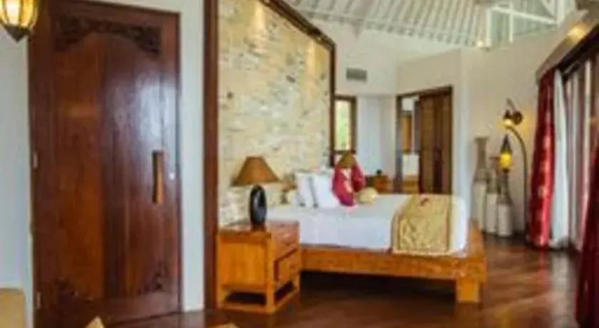 Bed in Batu Karang Lembongan Resort & Spa Bed in Batu Karang Lembongan Resort & Spa