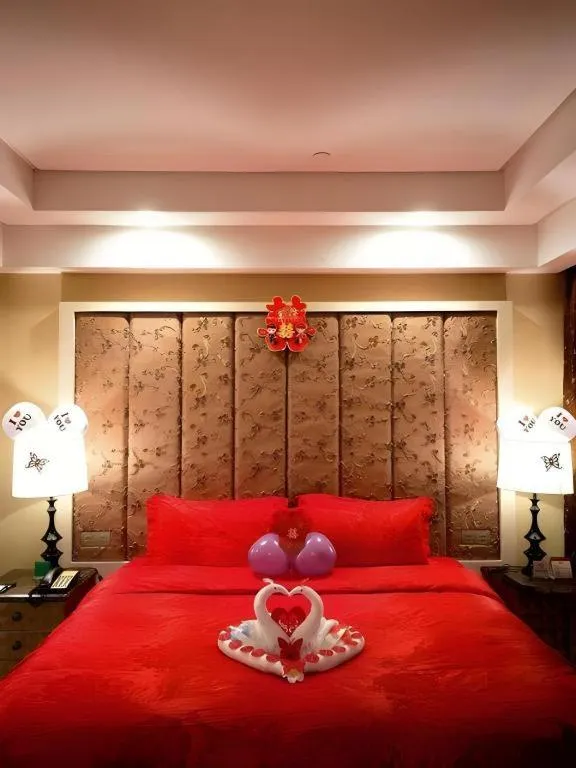 Bed in Yihe Grand Hotel