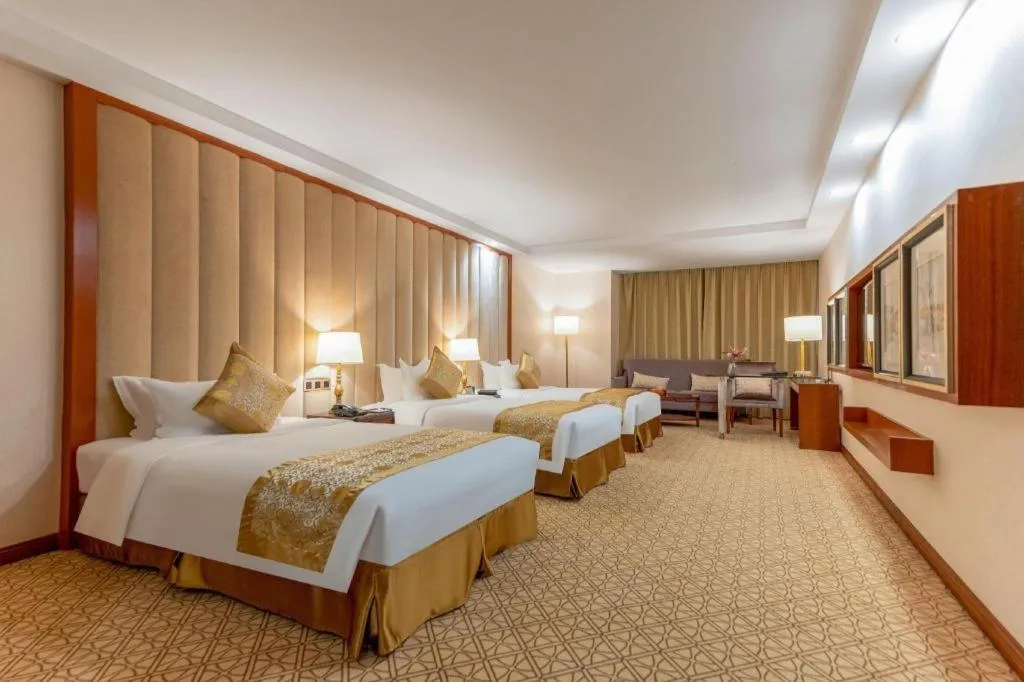 Bed in Yihe Grand Hotel