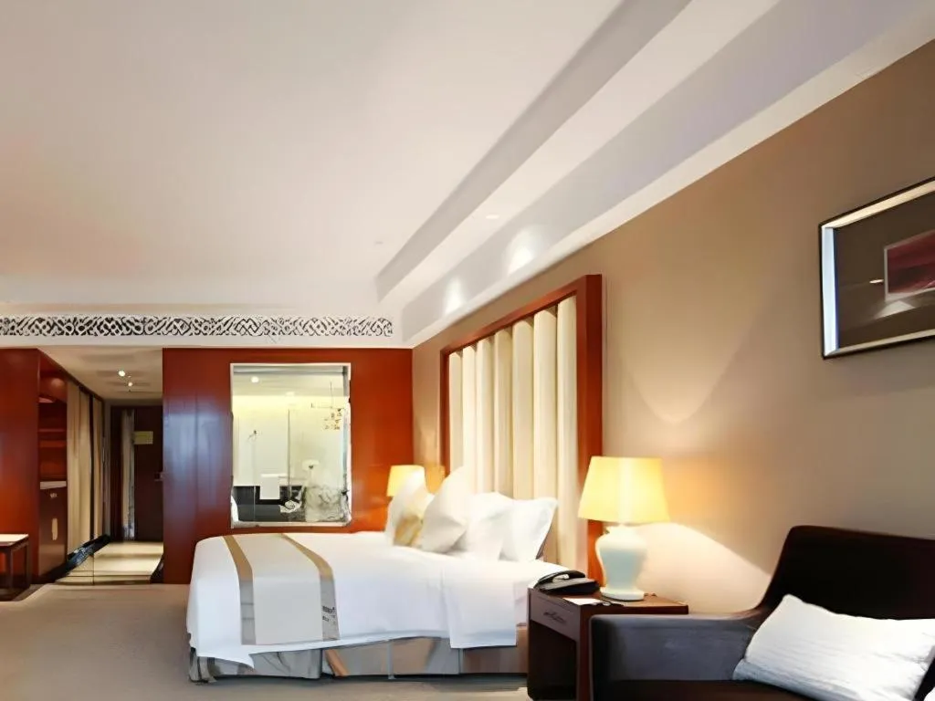 Bed in Yihe Grand Hotel