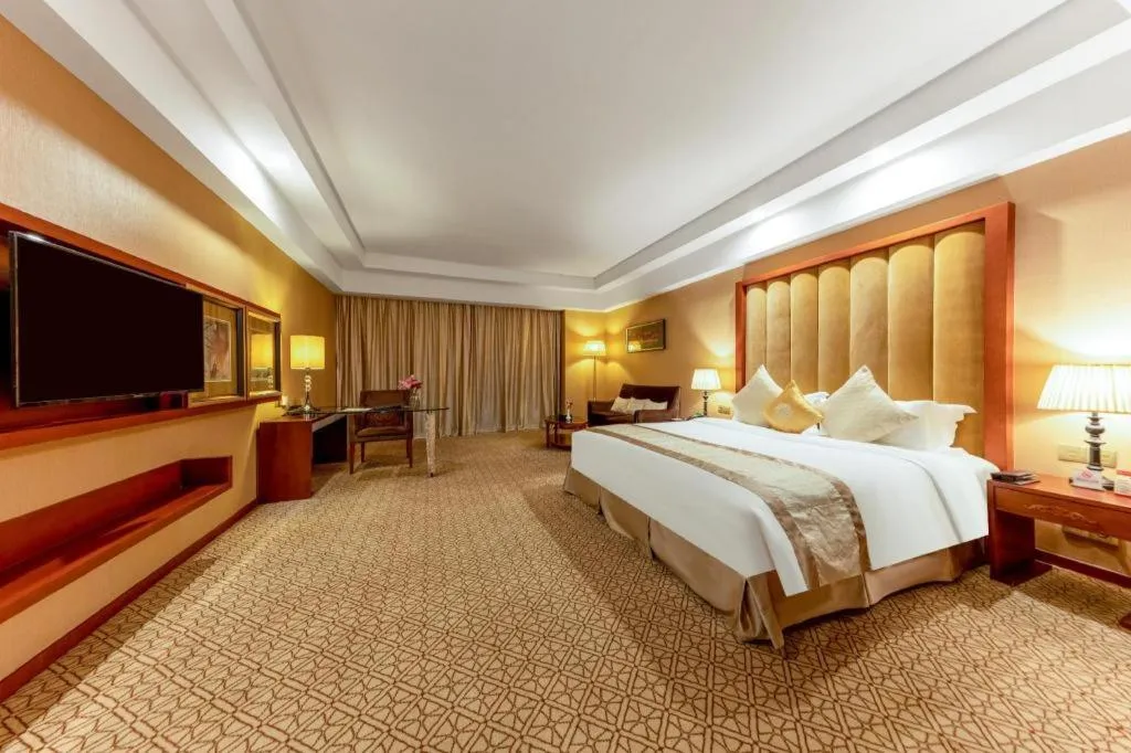 Bed in Yihe Grand Hotel