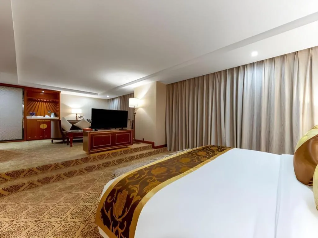 Bed in Yihe Grand Hotel
