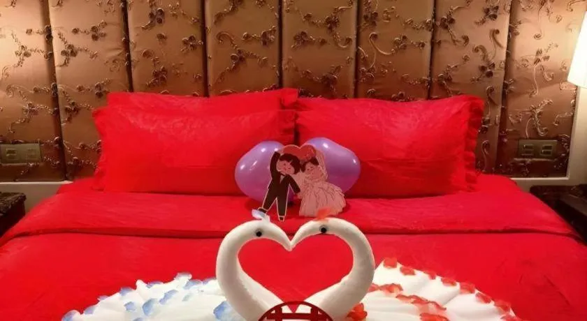 Bed in Yihe Grand Hotel