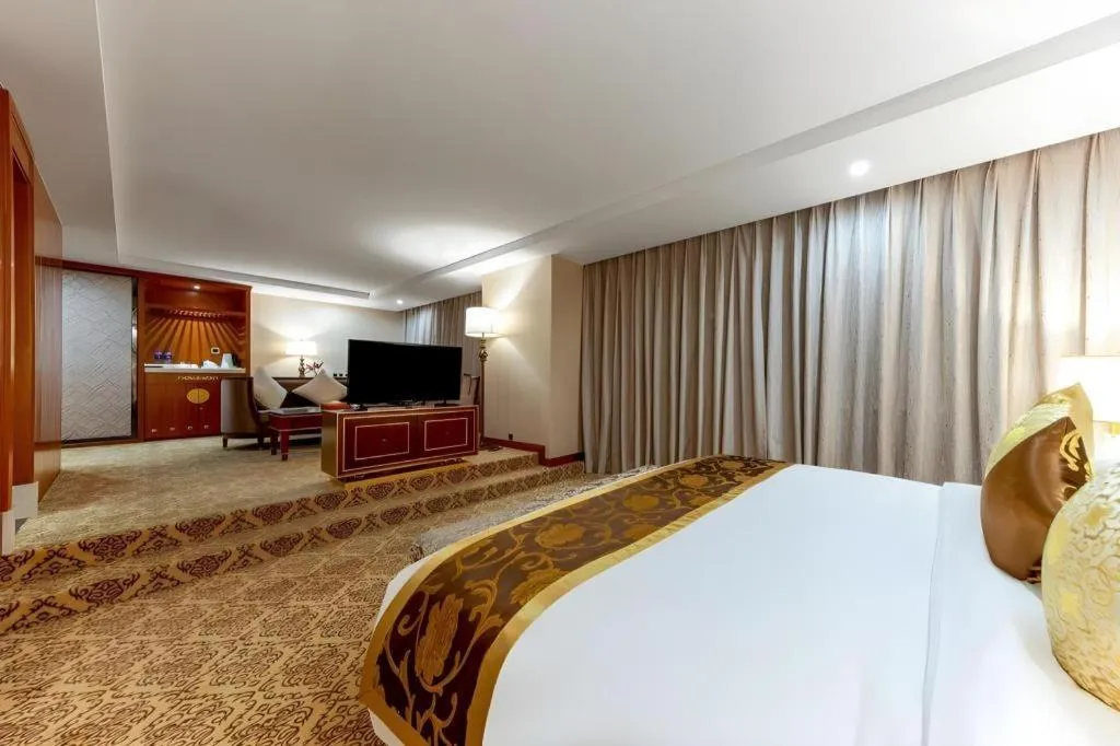 Bed in Yihe Grand Hotel