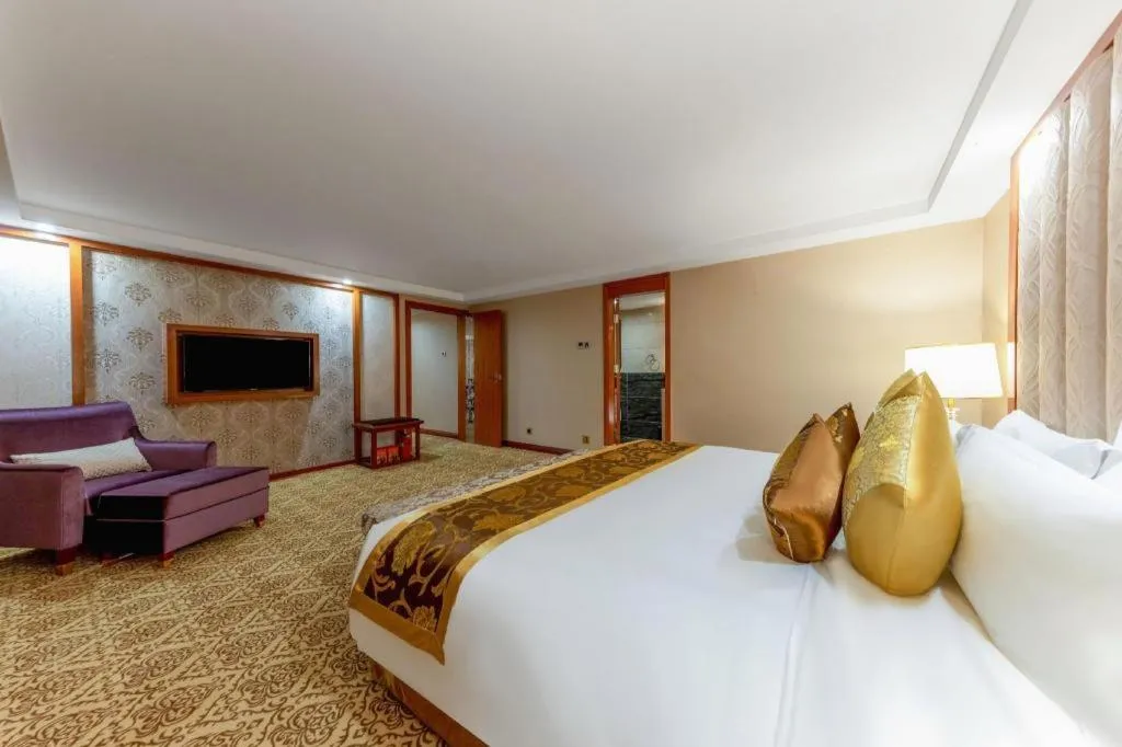 Bed in Yihe Grand Hotel