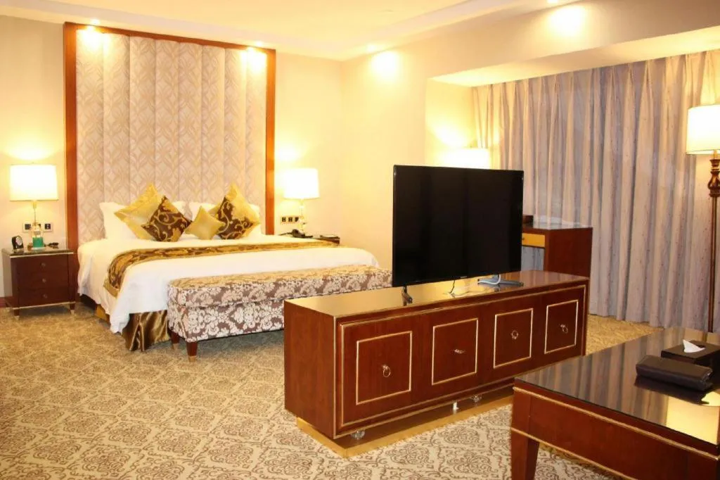 Bed in Yihe Grand Hotel