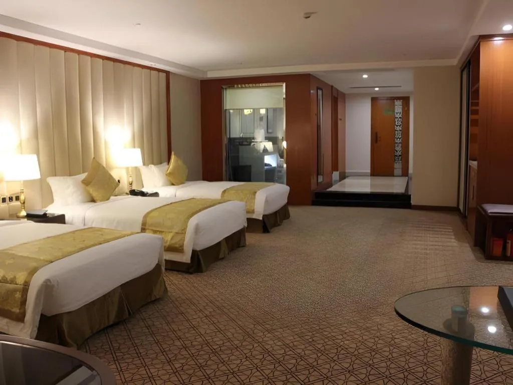 Bed in Yihe Grand Hotel