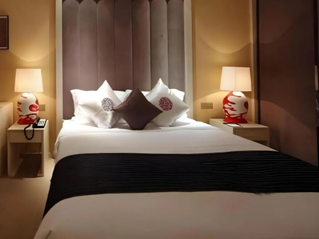 Bed in Yihe Grand Hotel