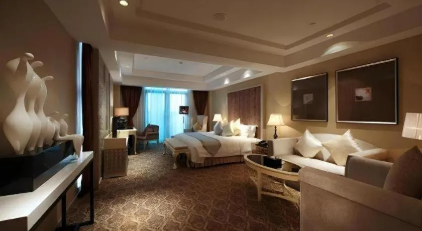 Bed in Yihe Grand Hotel
