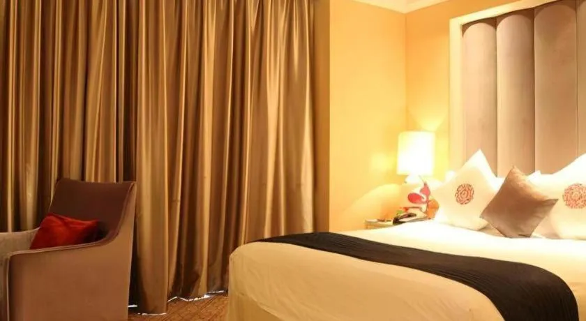 Bed in Yihe Grand Hotel