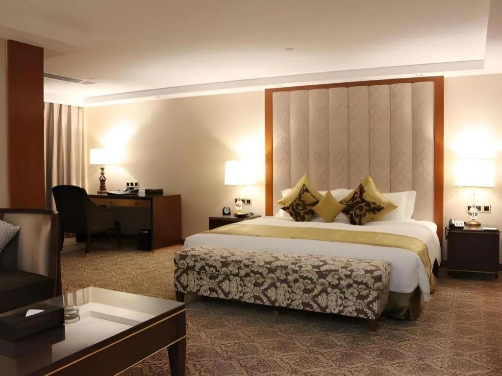 Bed in Yihe Grand Hotel